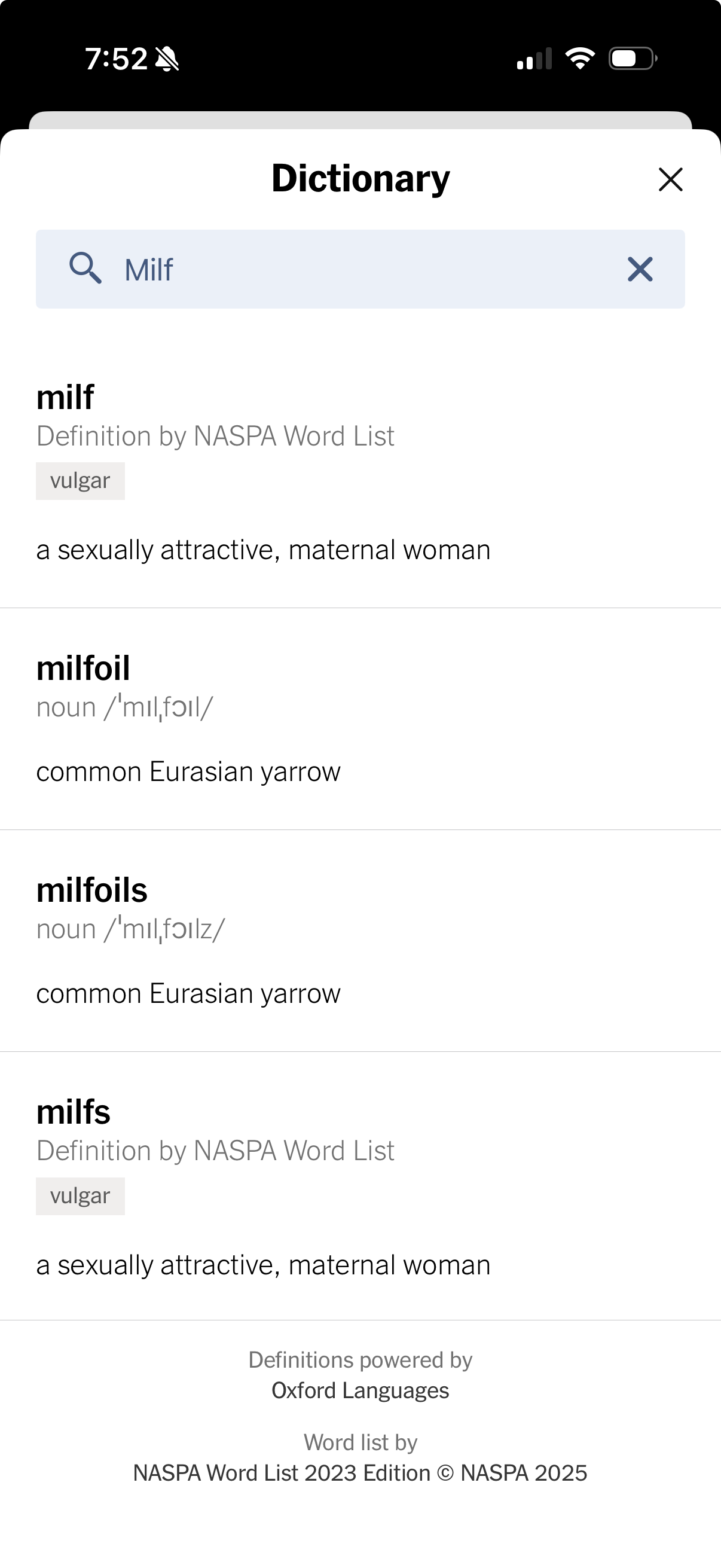 Screenshot of a smart phone dictionary app displaying definitions for the words milf, milfoil, and milfoils, including a vulgar definition of milf.