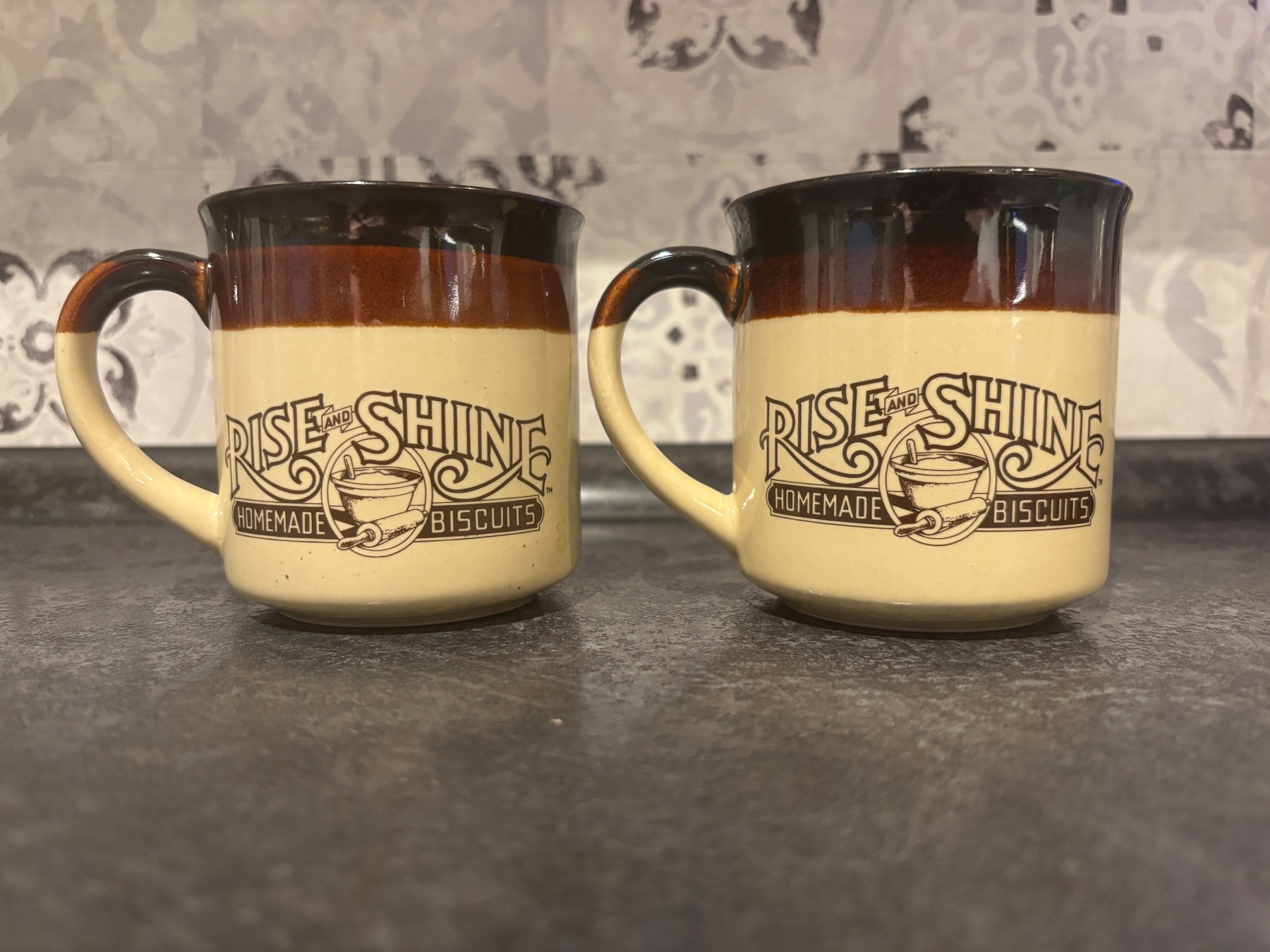 Two Hardee’s “Rise and Shine” mugs from 1986
