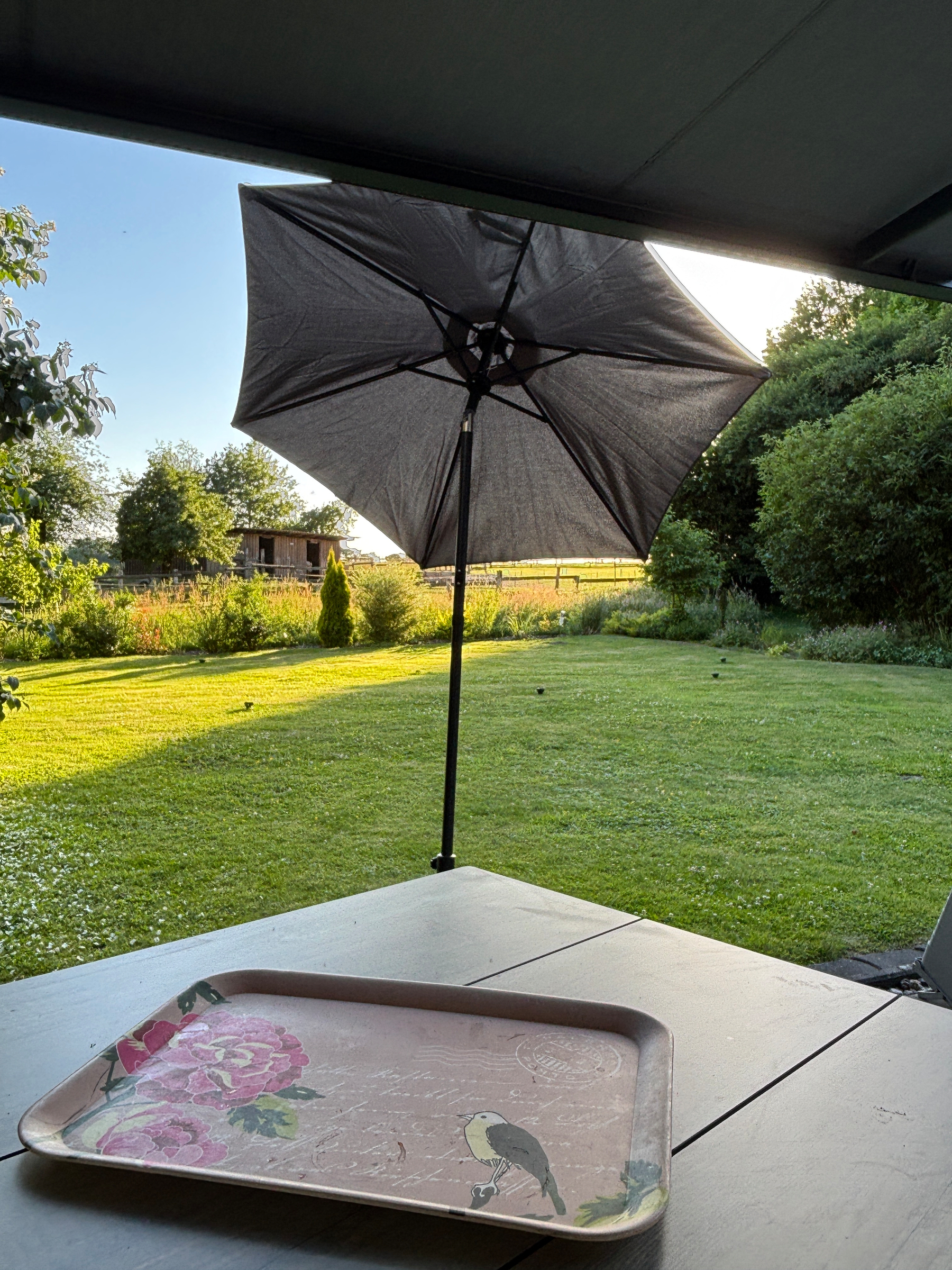 Sun umbrella giving shade in the evening 