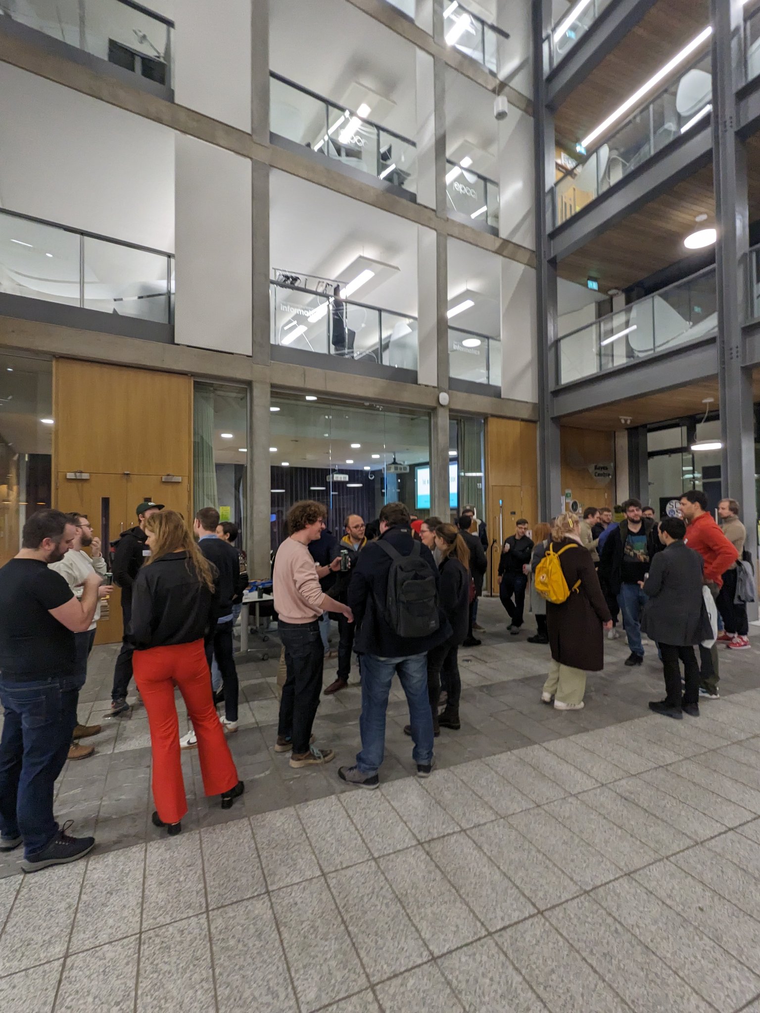 EdinburghJS Attendees in the atrium of the Bayes