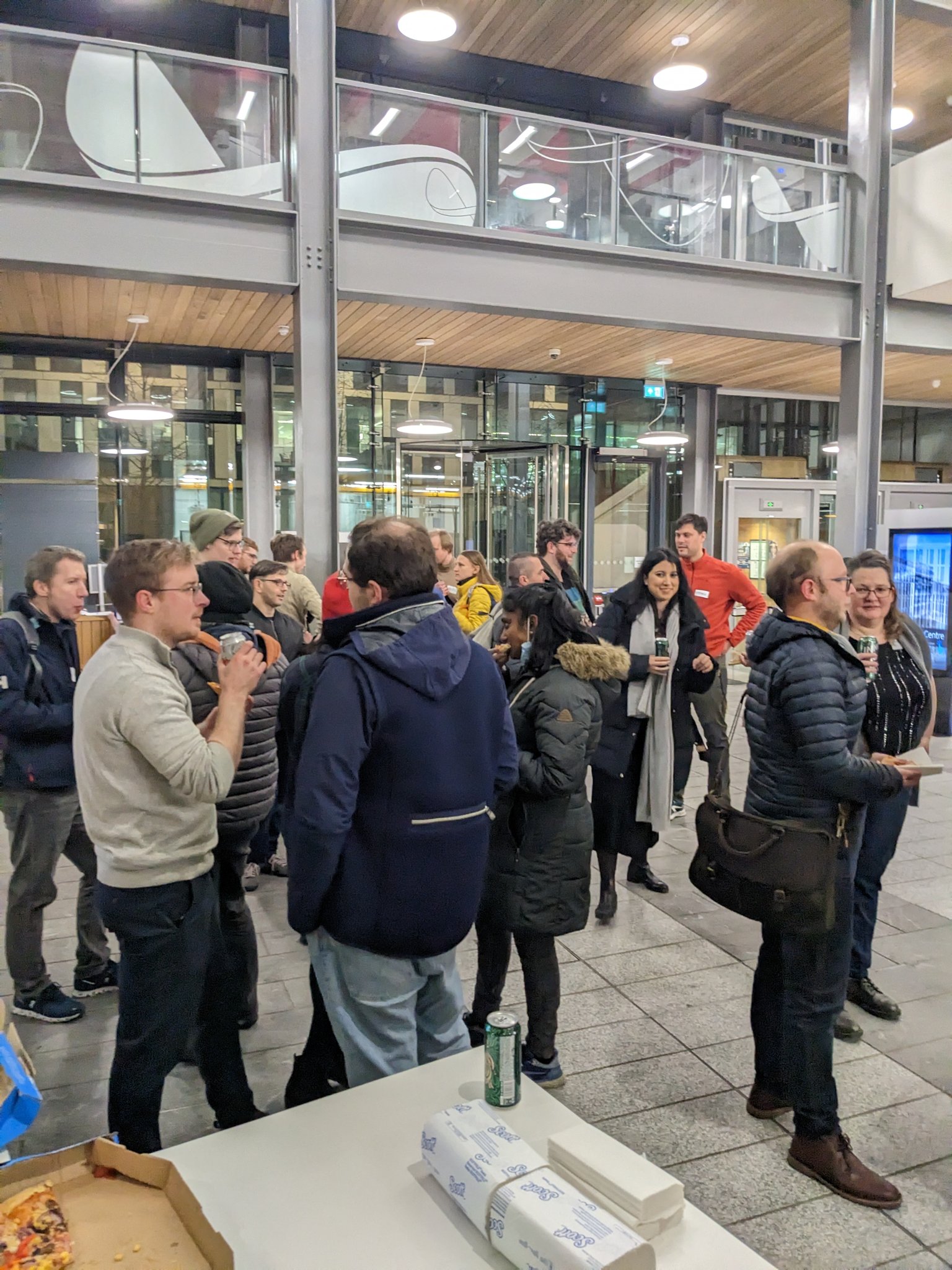 EdinburghJS Attendees in the atrium of the Bayes