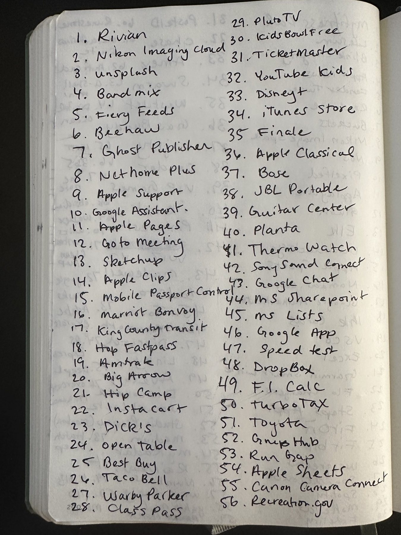 A handwritten list of 60 items, including names like "Rivian," "YouTube Music," and "Google Assistant," is neatly arranged in a notebook.