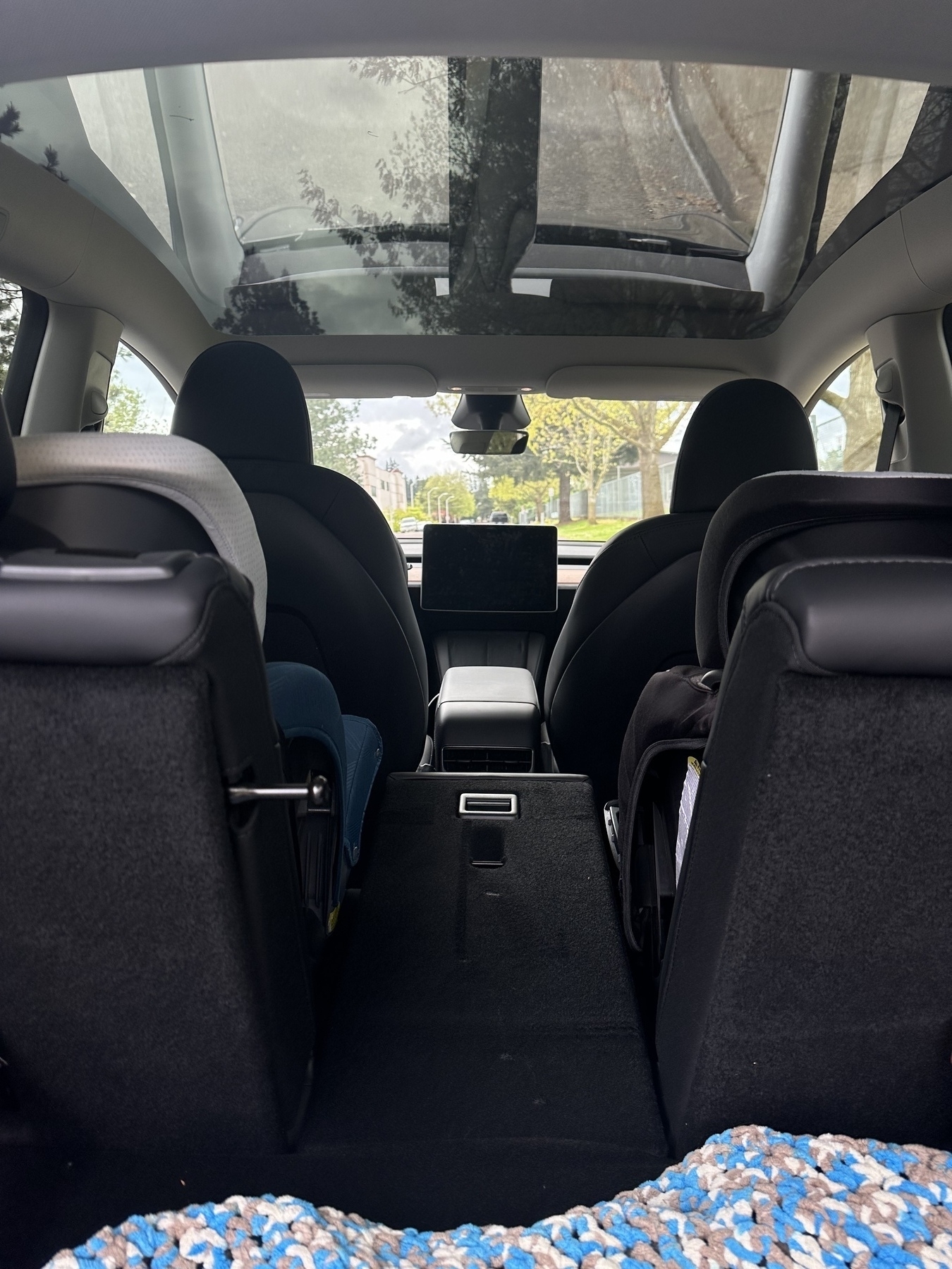 Inside cabin of a Model Y as viewed from the hatchback. 