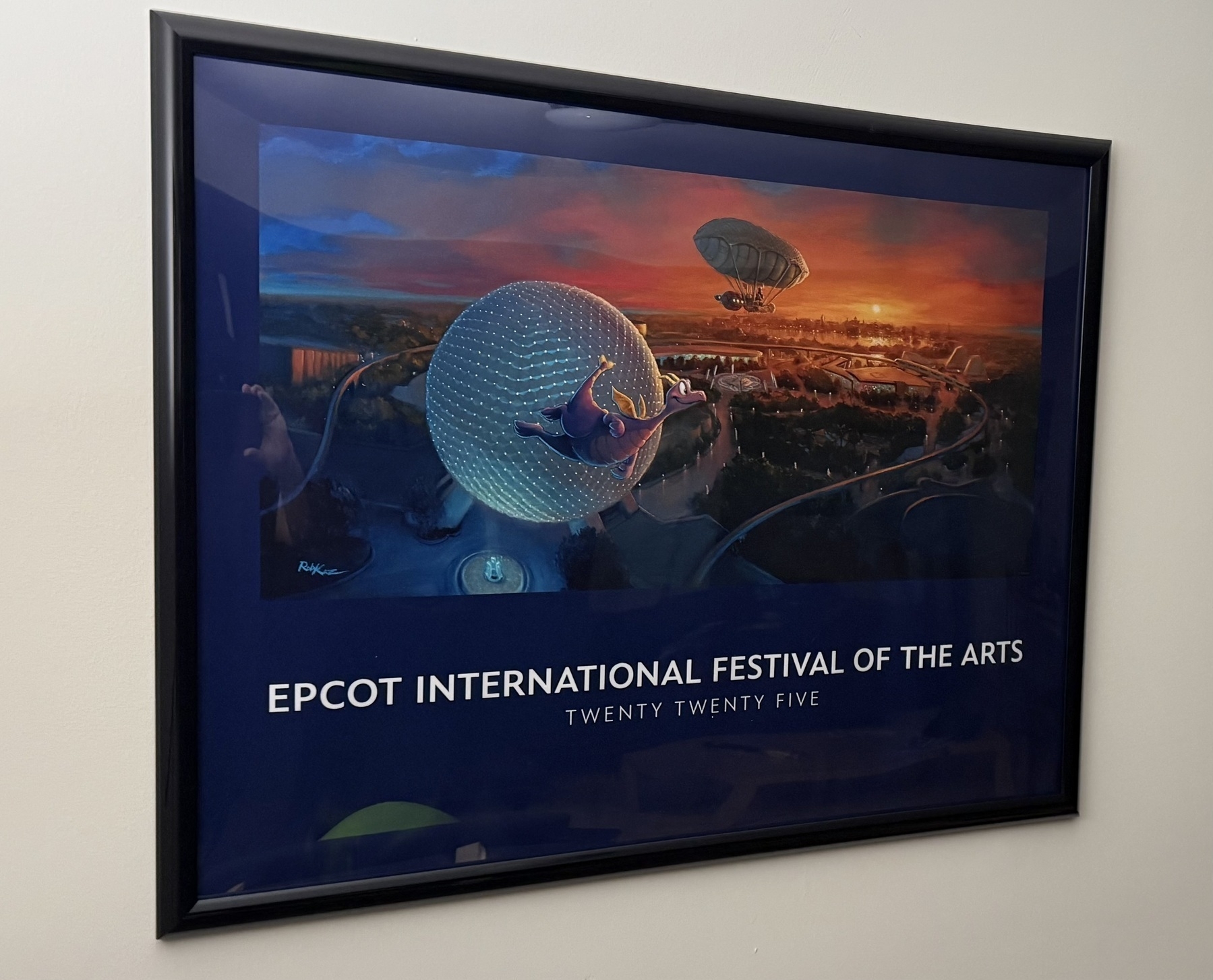 The 2025 Epcot Festival of the Arts poster. Figment flying above Spaceship Earth with the remainder of Epcot in the background