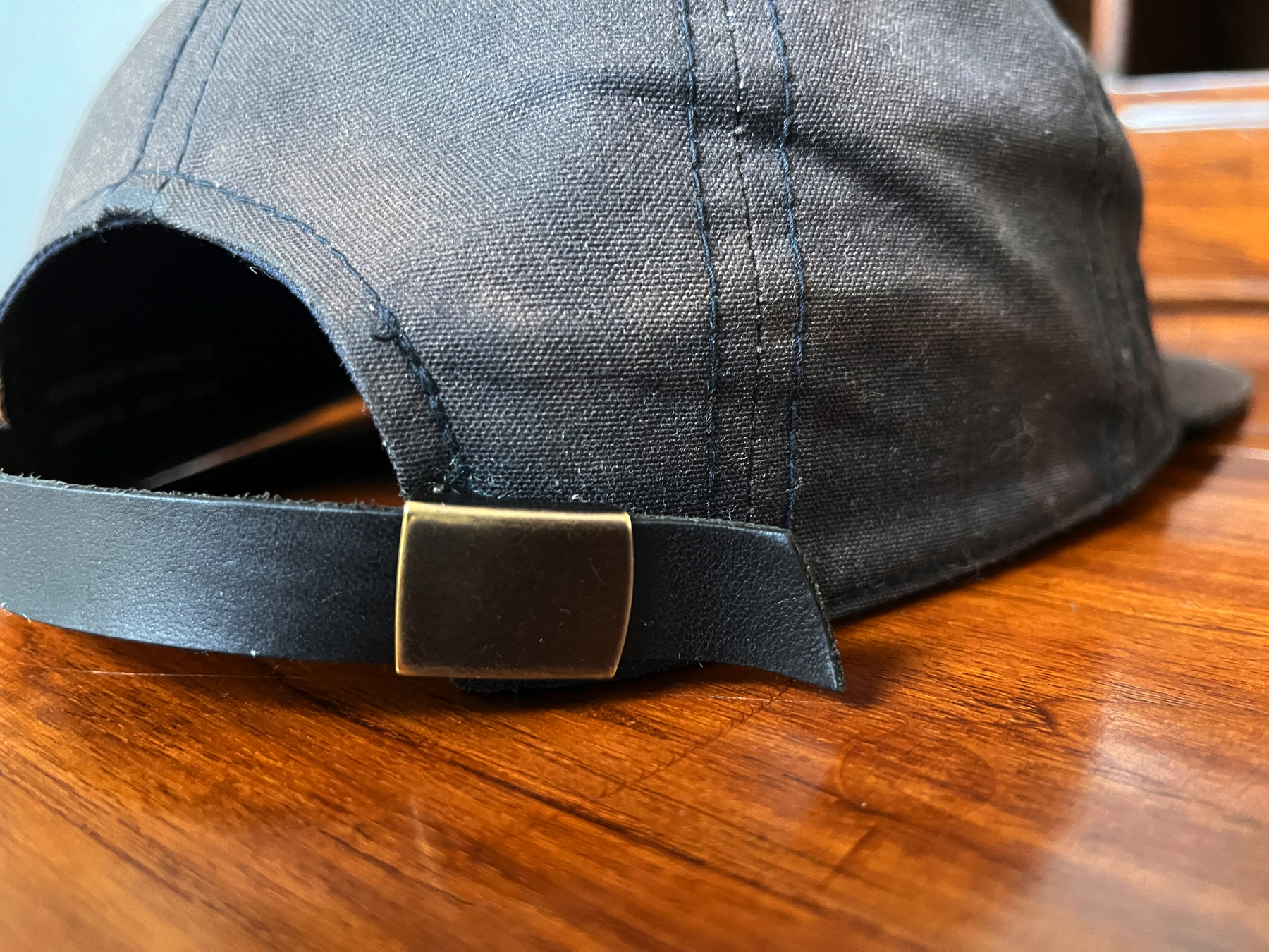 Close-up of the leather strap in the back.