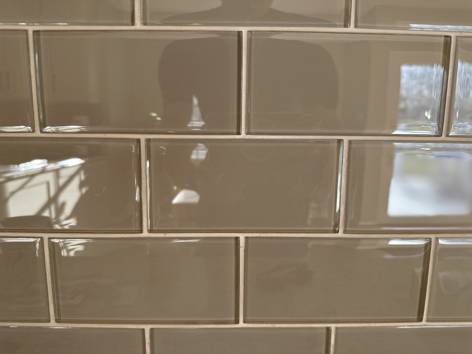 Glass subway tiles with a reflection