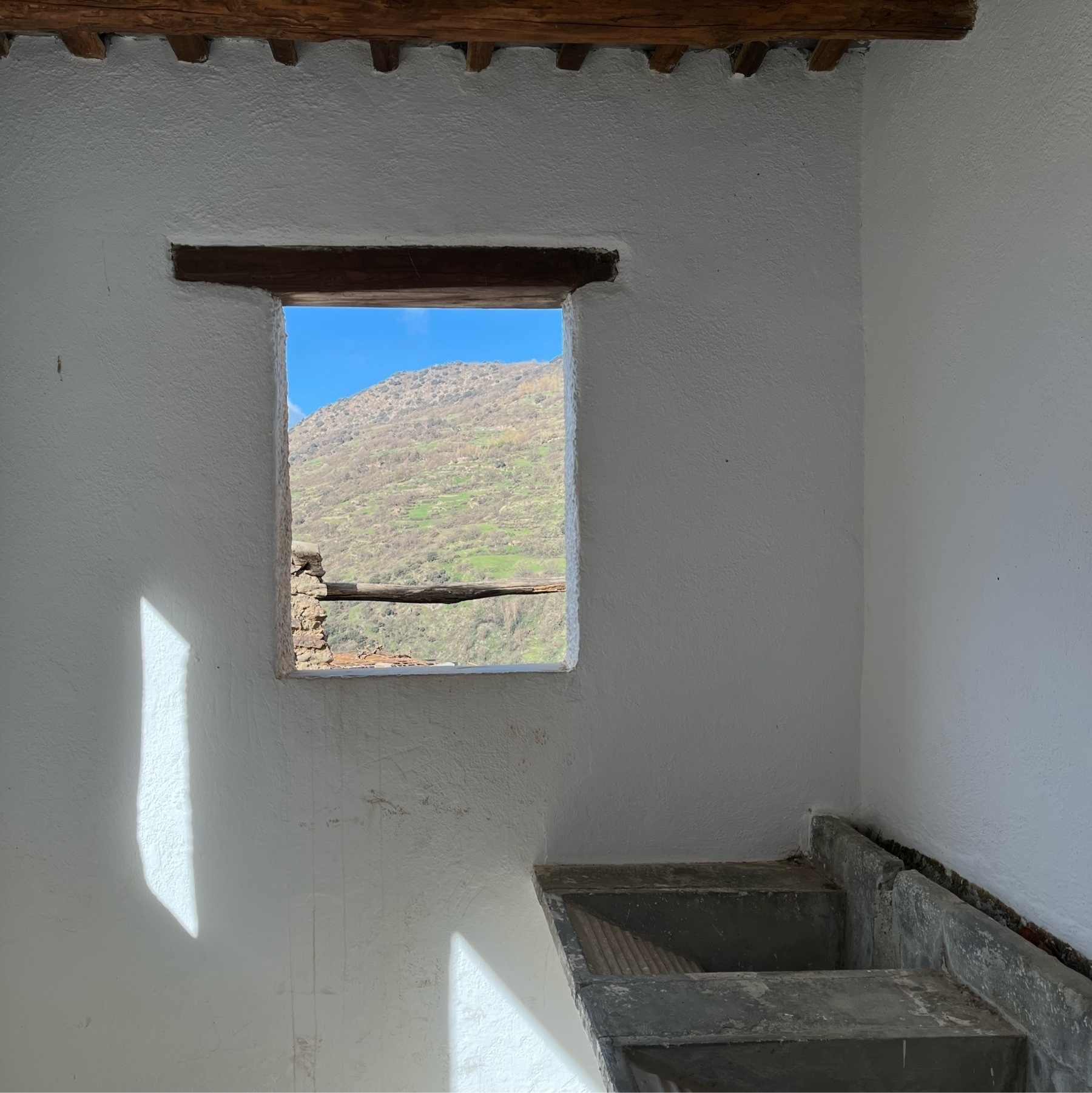 Window with views into the mountains