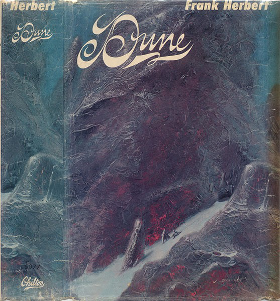 Cover of the book “Dune” by Frank Herbert, featuring the title in ornate script over an abstract rendering of dunes or a mountainous landscape in shades of violet and blue.