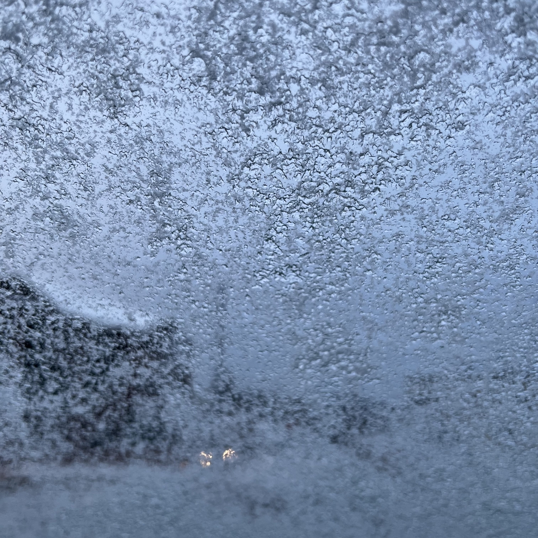 A frozen windshield from the inside.
