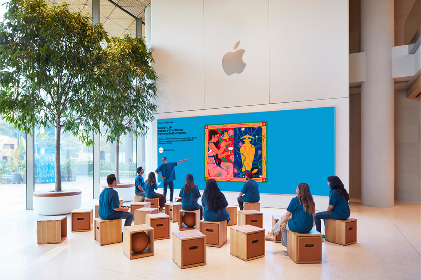 Video wall with Apple logo above it at Apple BKC.