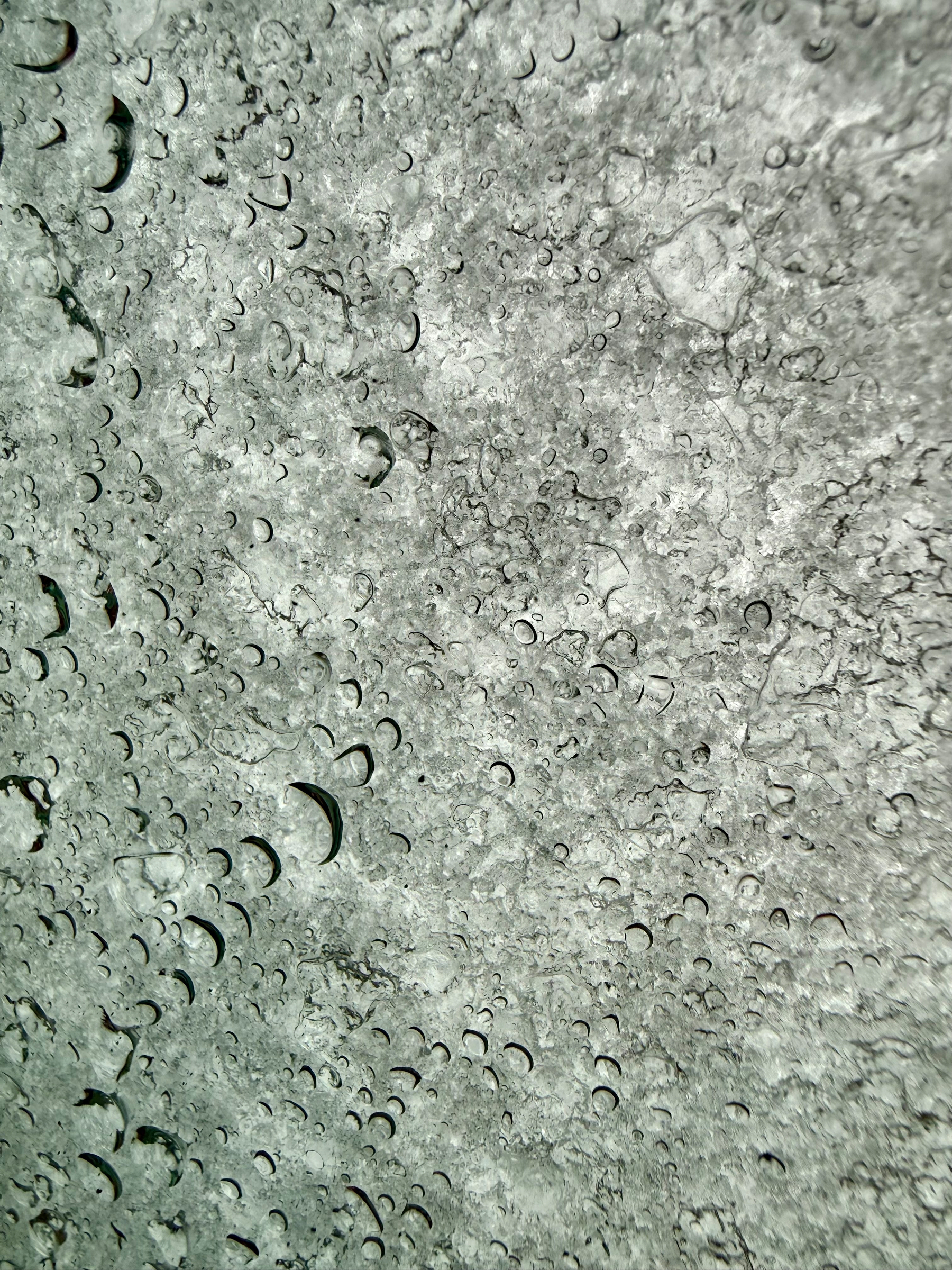 Icey snow cover glass as seen from underneath 