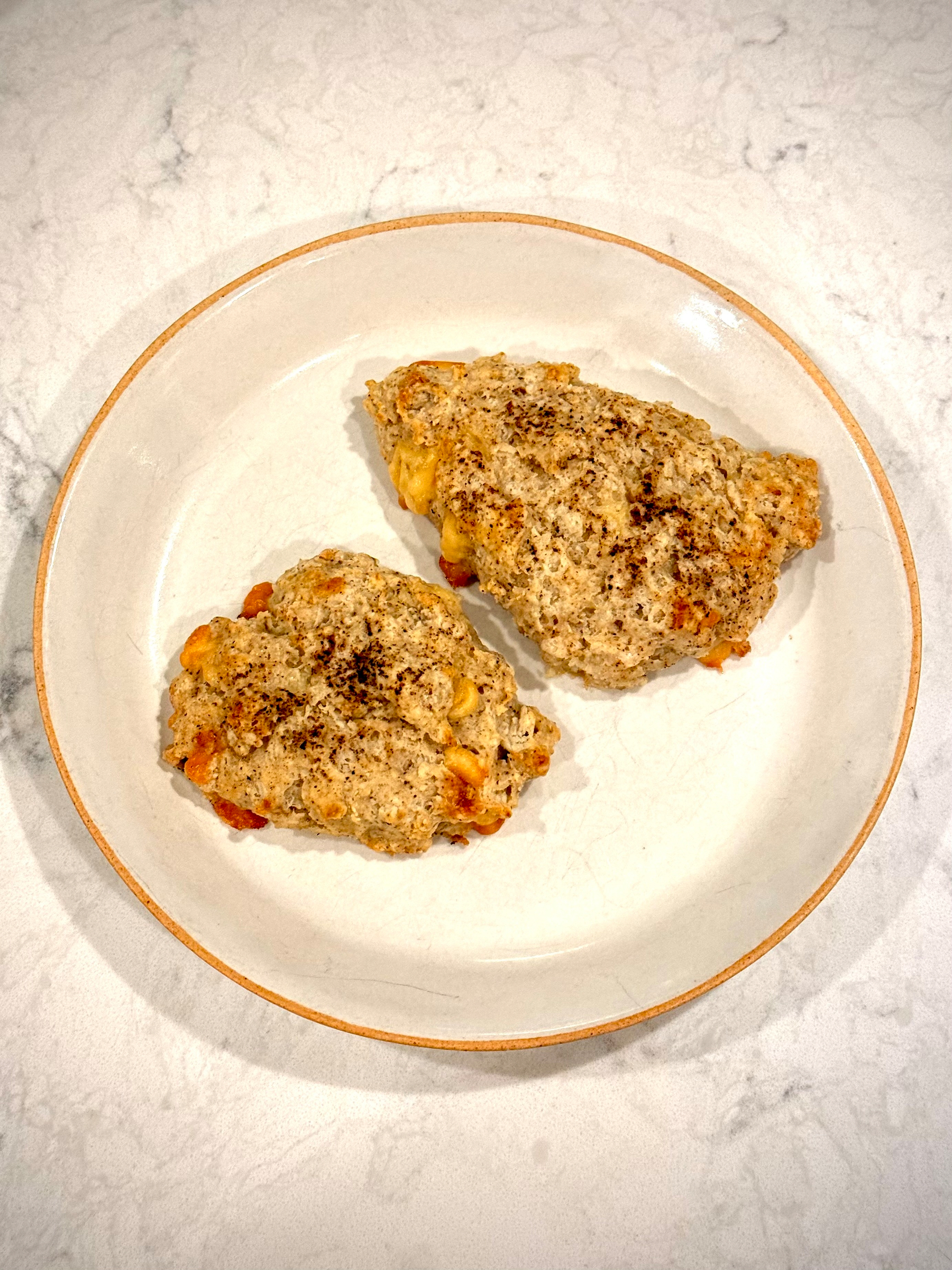 Two scones on a plate