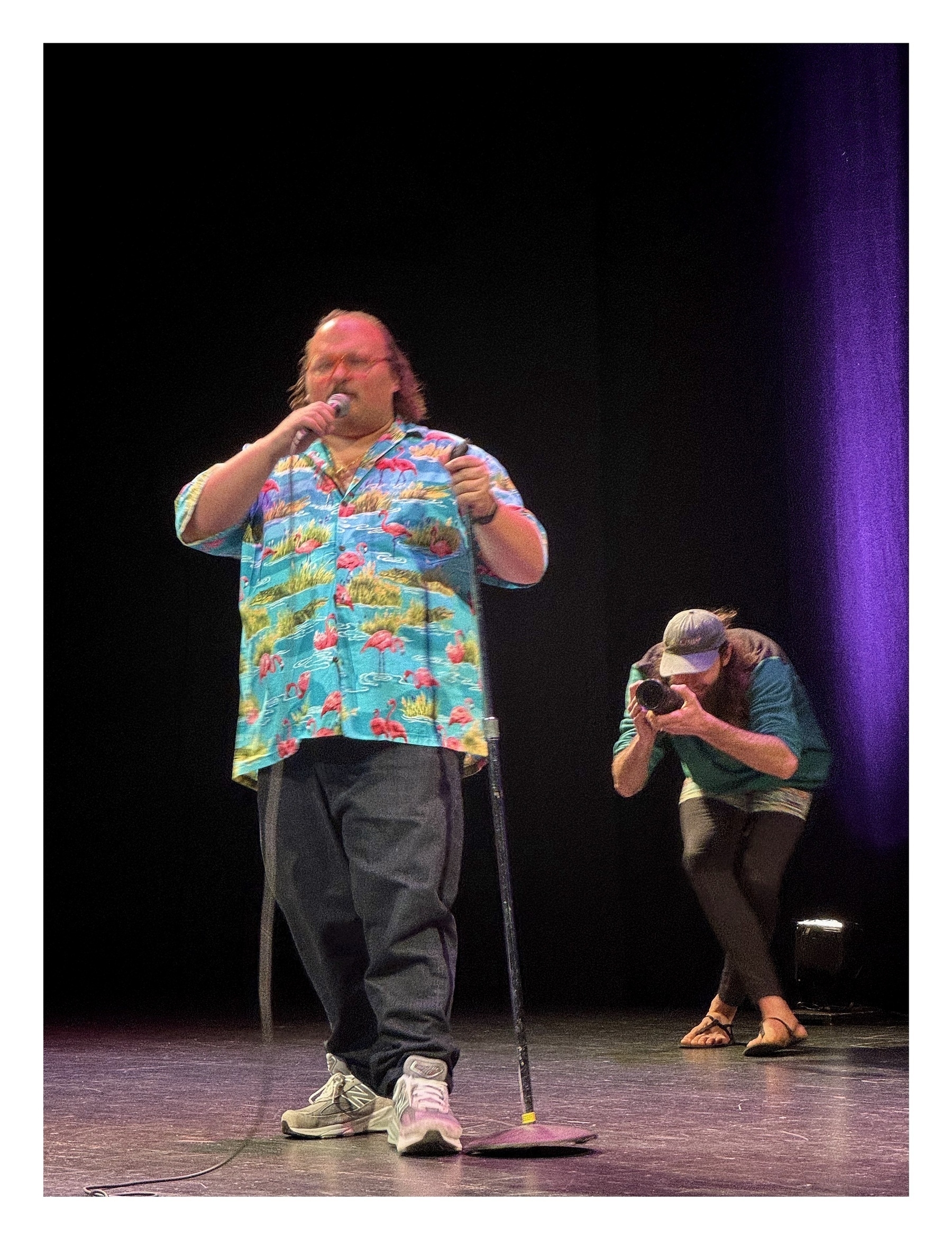 Stavros halkias on stage in a Hawaiian shirt