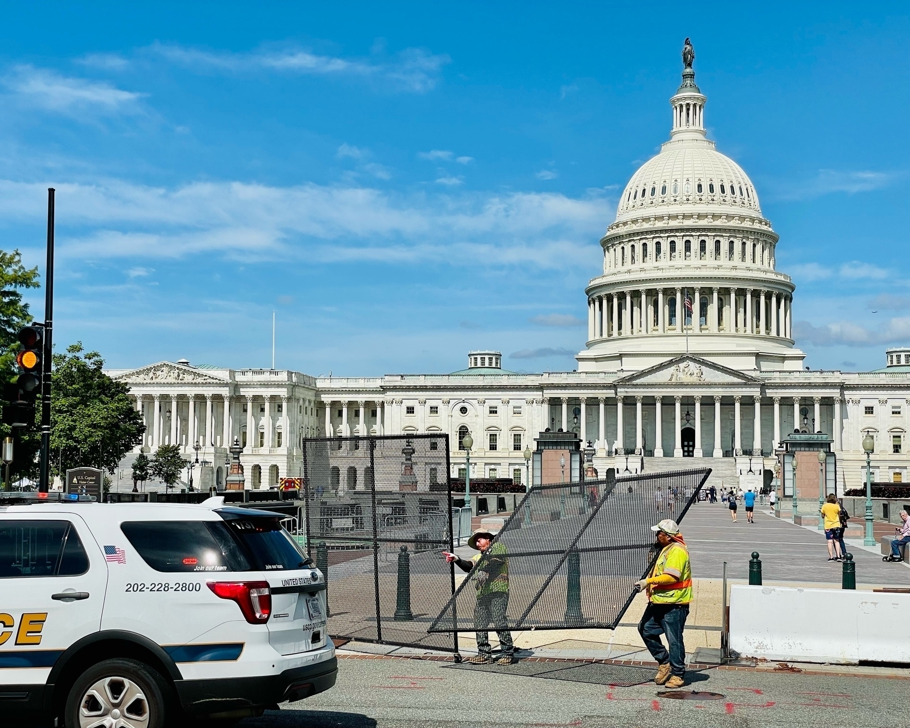 Fence in front of the East face of the US Capitol is disassembled