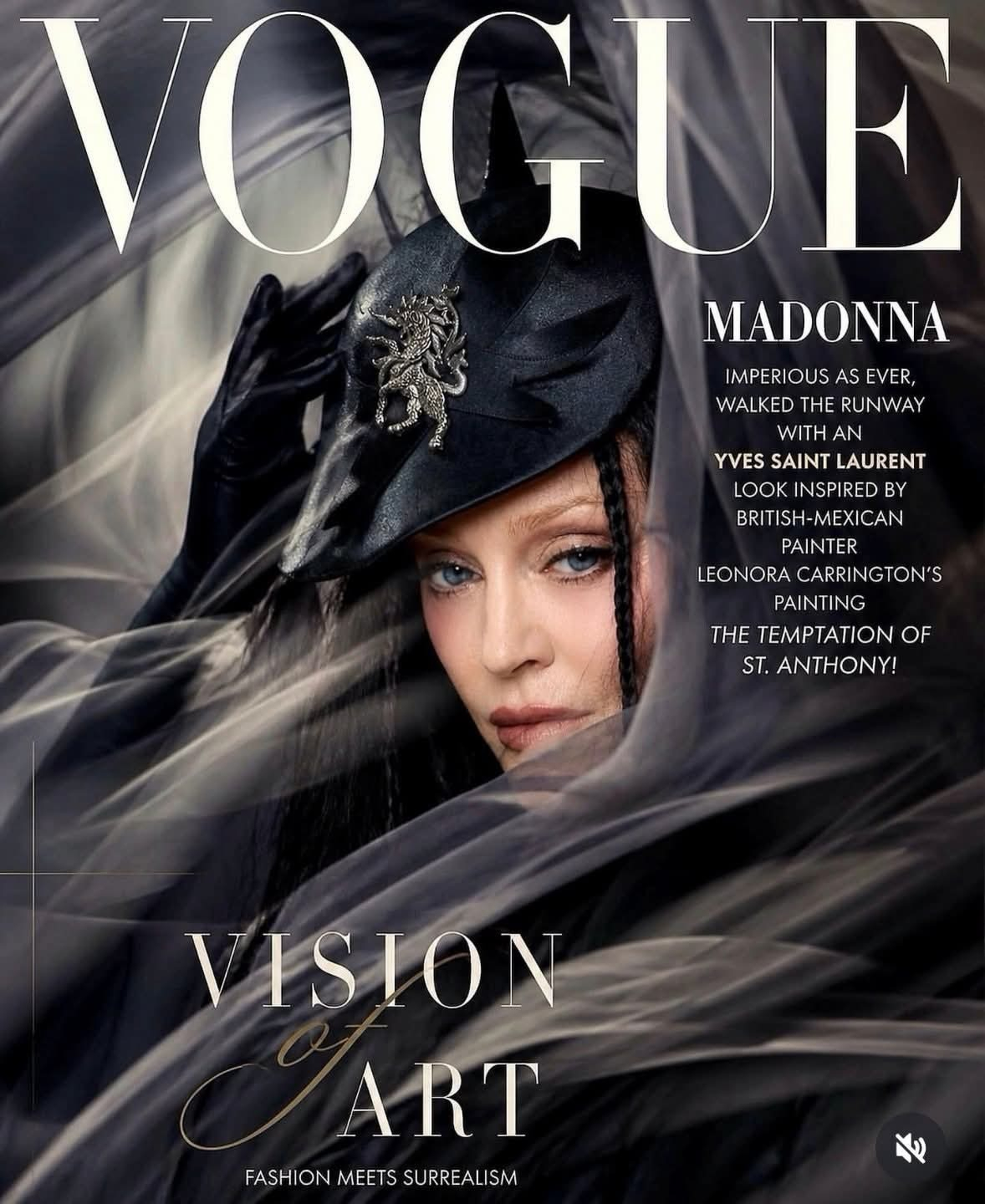 Auto-generated description: Madonna appears on the cover of Vogue, wearing a black hat and veil, with text highlighting a vision of art and fashion.