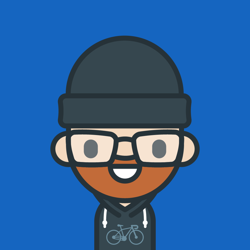 Profile picture in the unmistakable style of Andy Carolan. Me with a cap, glasses and a hoodie with a racing bike on it.