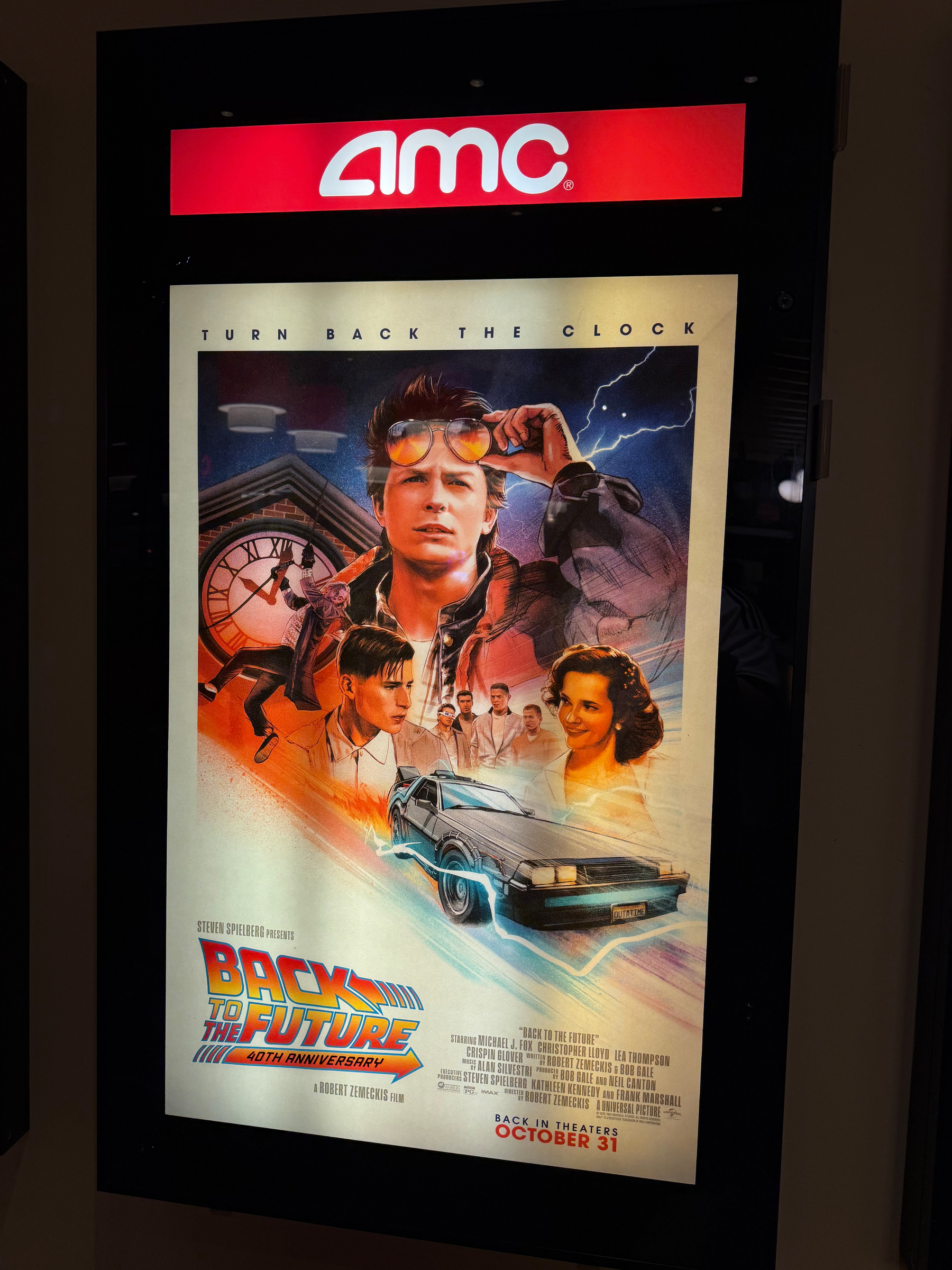 Picture of the BttF movie poster hanging in the theater