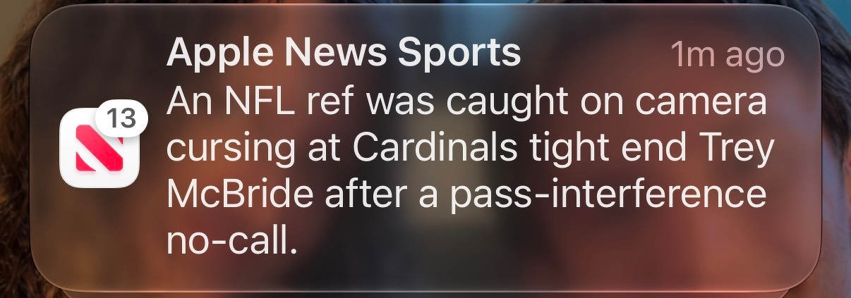 Apple News Headline: An NFL ref was caught on camera cursing at Cardinals tight end Trey McBride after a pass-interference no-call.