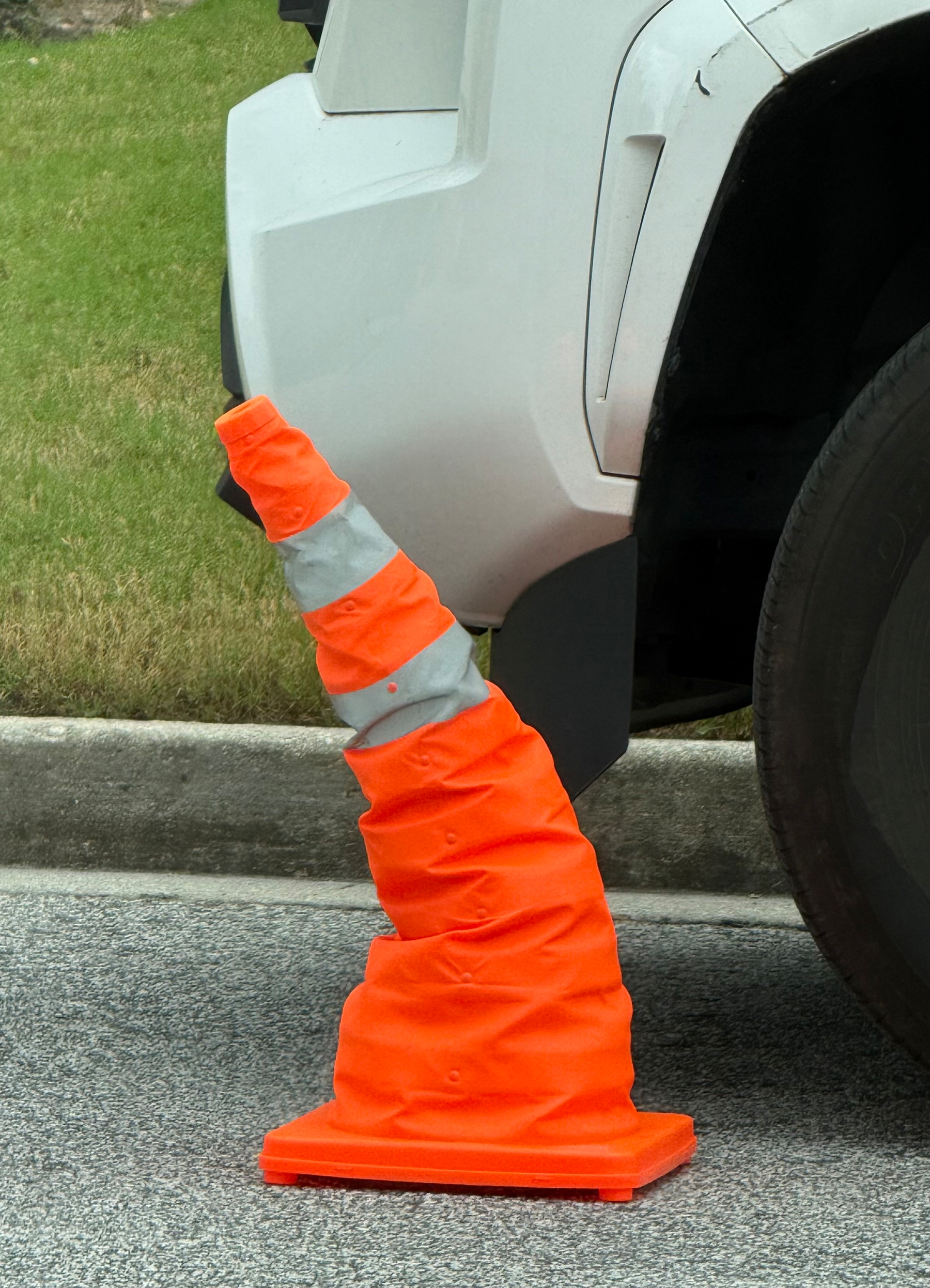 Photo of a construction cone that looks just like the Sorting Hat from Harry Potter