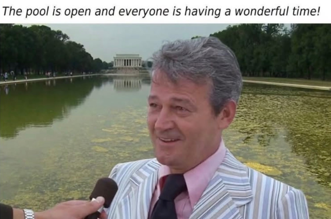Image of the mayor in Jaws standing in front of the Washington reflecting pool