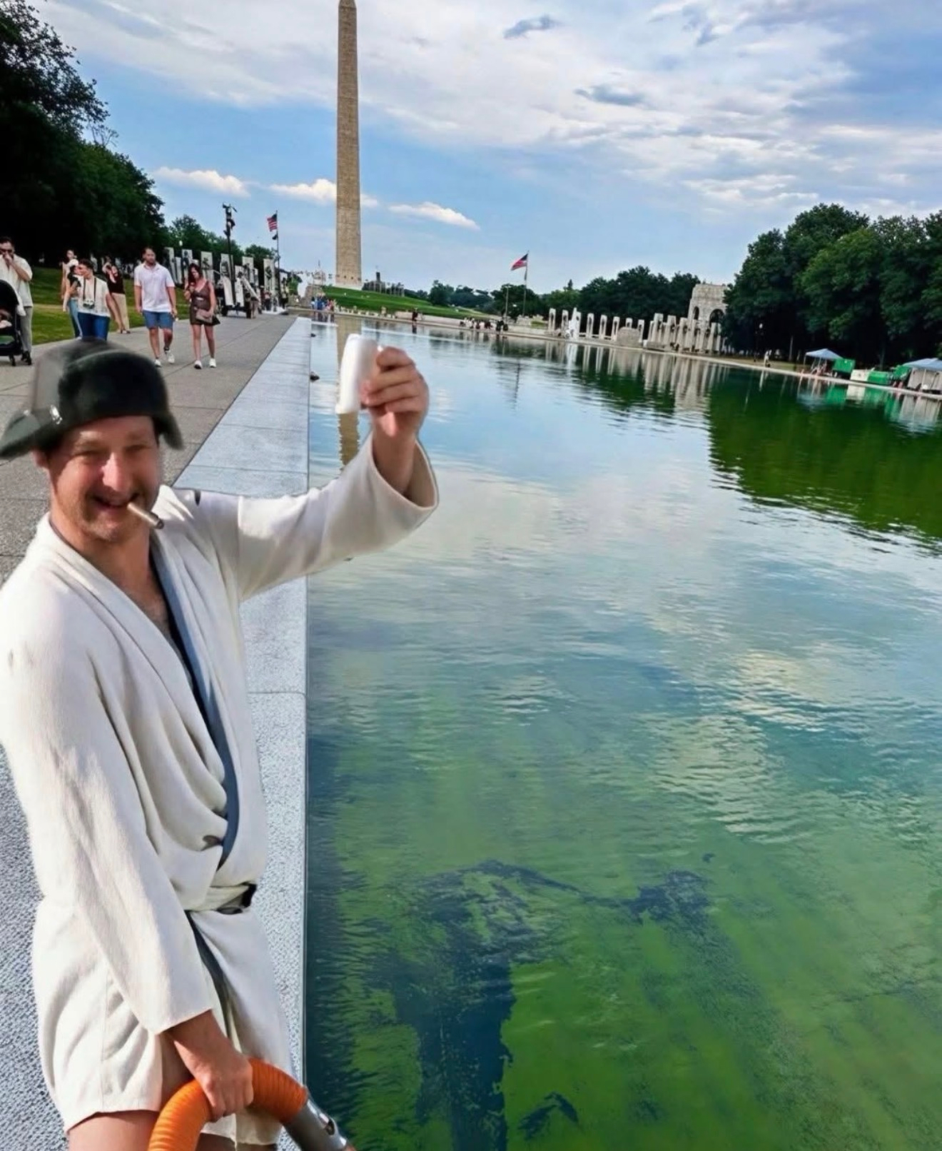 Meme image of Cousin Eddie from the National Lampoons Vacation movies emptying the “shitter” into the Washington reflecting pool