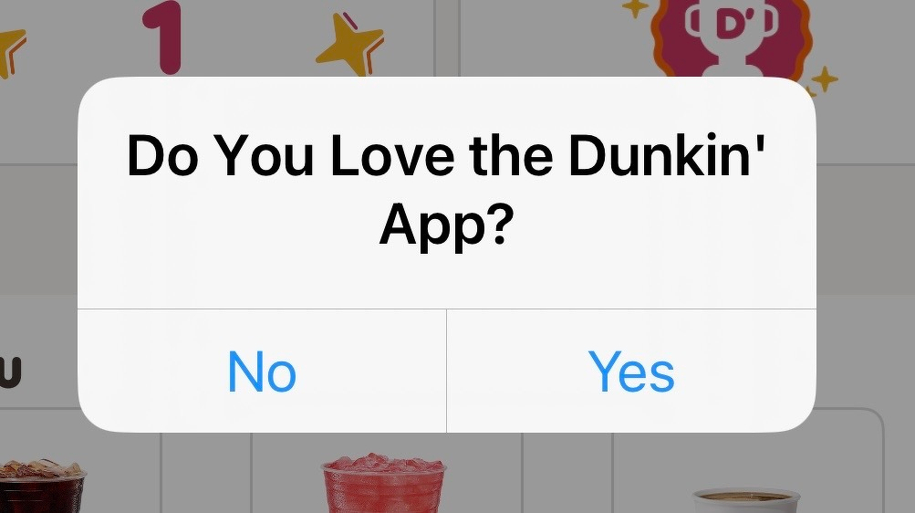 Screenshot from the Dunkin’ app asking me if I love the Dunkin’ app. The only two available answers are “yes” and “no”.