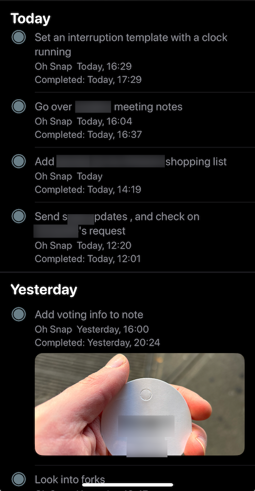 Auto-generated description: A digital to-do list displays tasks with completion times and a photo of a person holding a small circular object.