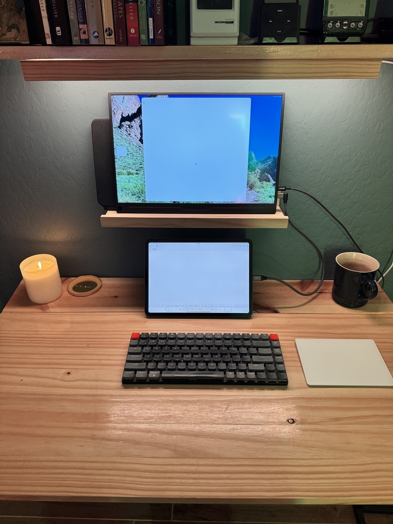 Simple set up of an iPad connected to an external monitor and Bluetooth keyboard. 