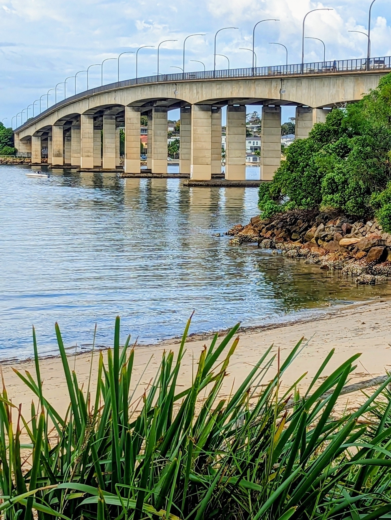 A view of the road bridge at the mouth of the Georges River in southern Sydney, showing many support pillars.