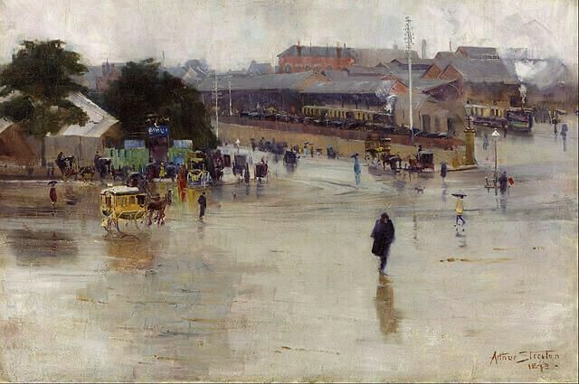 Painting of Redfern Station in the rain, by Arthur Streeton, 1893. Public Domain. In the foreground, a wide, rain-drenched road reflects the cloudy sky.