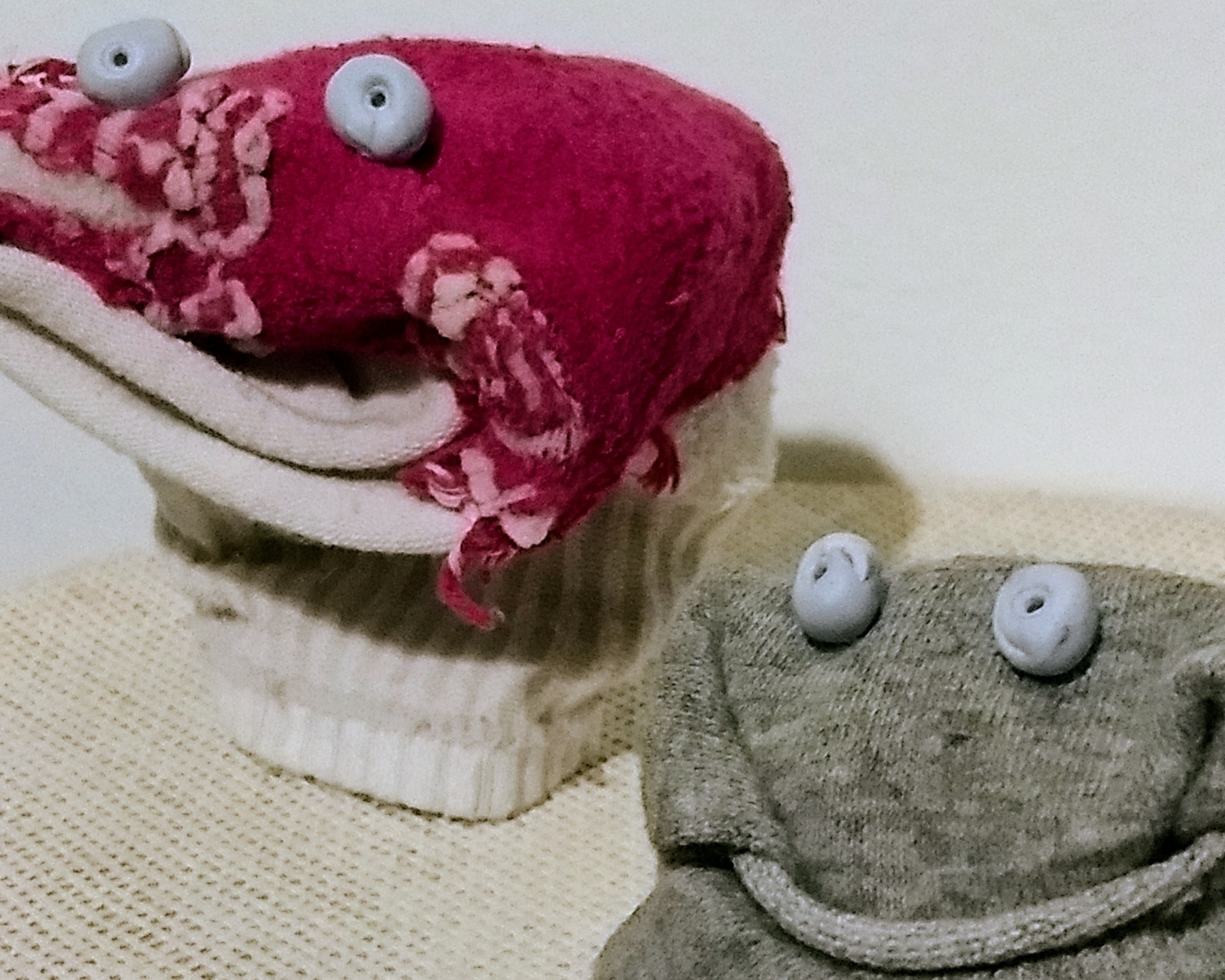 With blu-tac eyes, two socks that don’t match easily transform into sock puppets 