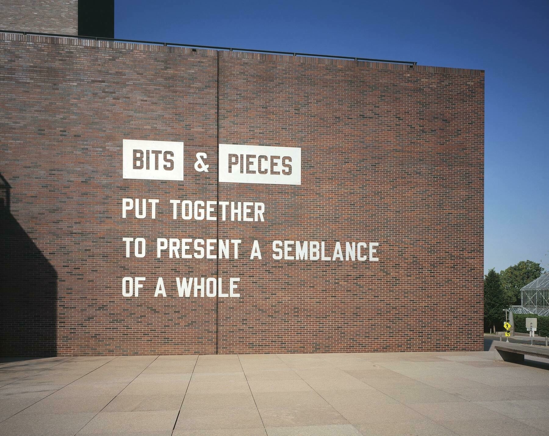 An artwork by Lawrence Weiner, entitled Bits and pieces put together to present a semblance of a whole
