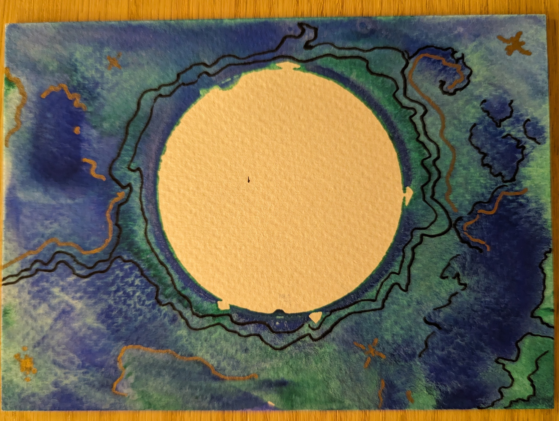 A circular blank space in the center is surrounded by abstract watercolor patterns in shades of blue and green with black and gold lines.