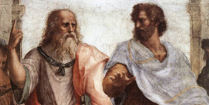 Two ancient philosophers engage in a thoughtful discussion, with one pointing upwards and the other gesturing outward. The figure on the left is Plato, which is also a portrait of Leonardo.