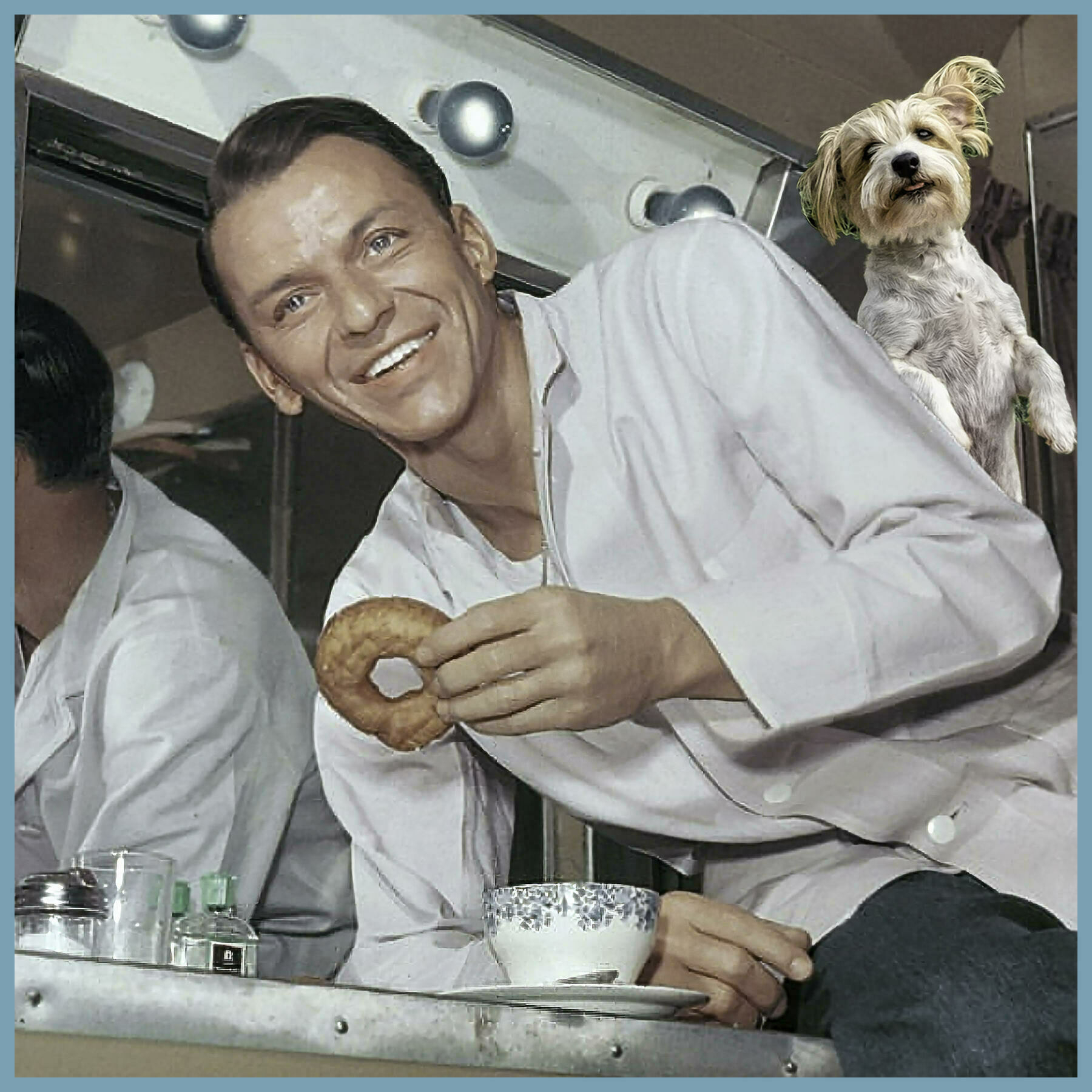 Frank Sinatra and Lucky O'Connell sharing a donut.
