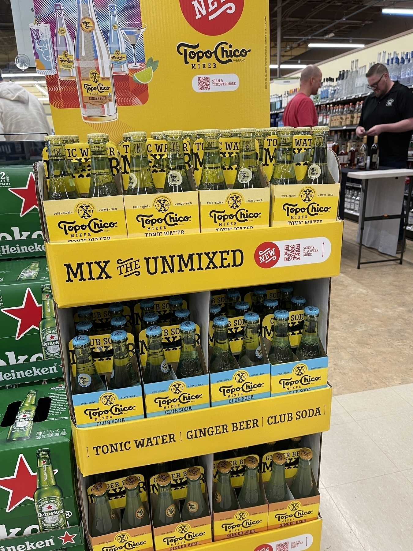 A display case of Topo Chico tonic water
