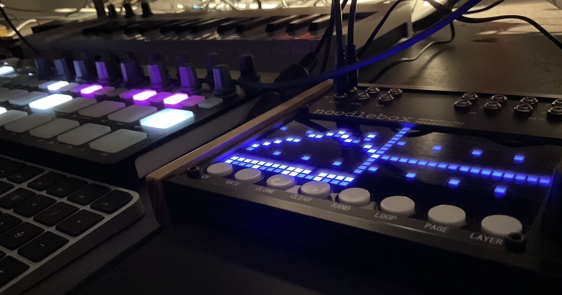 Light displays on sequencers representing notes which are turned into sound by a computer.