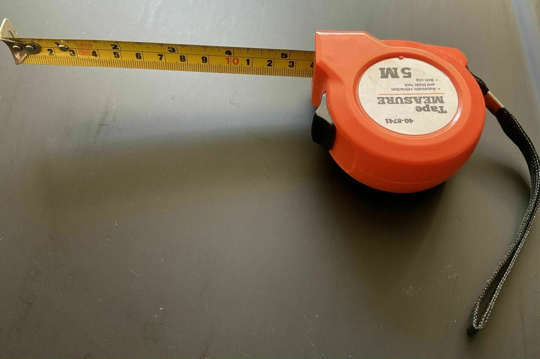 An orange tape measure 
