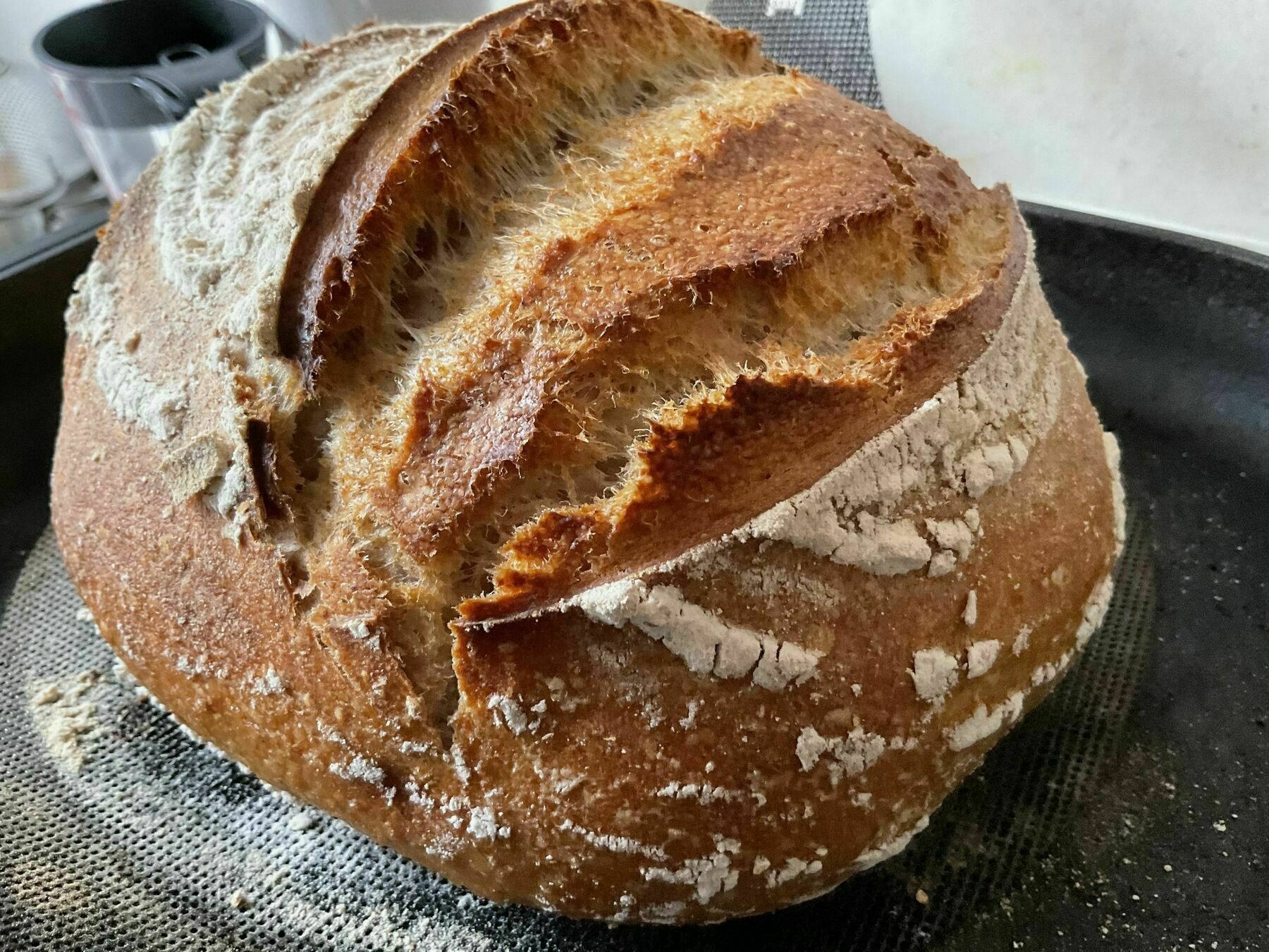 A freshly baked loaf of sourdough bread