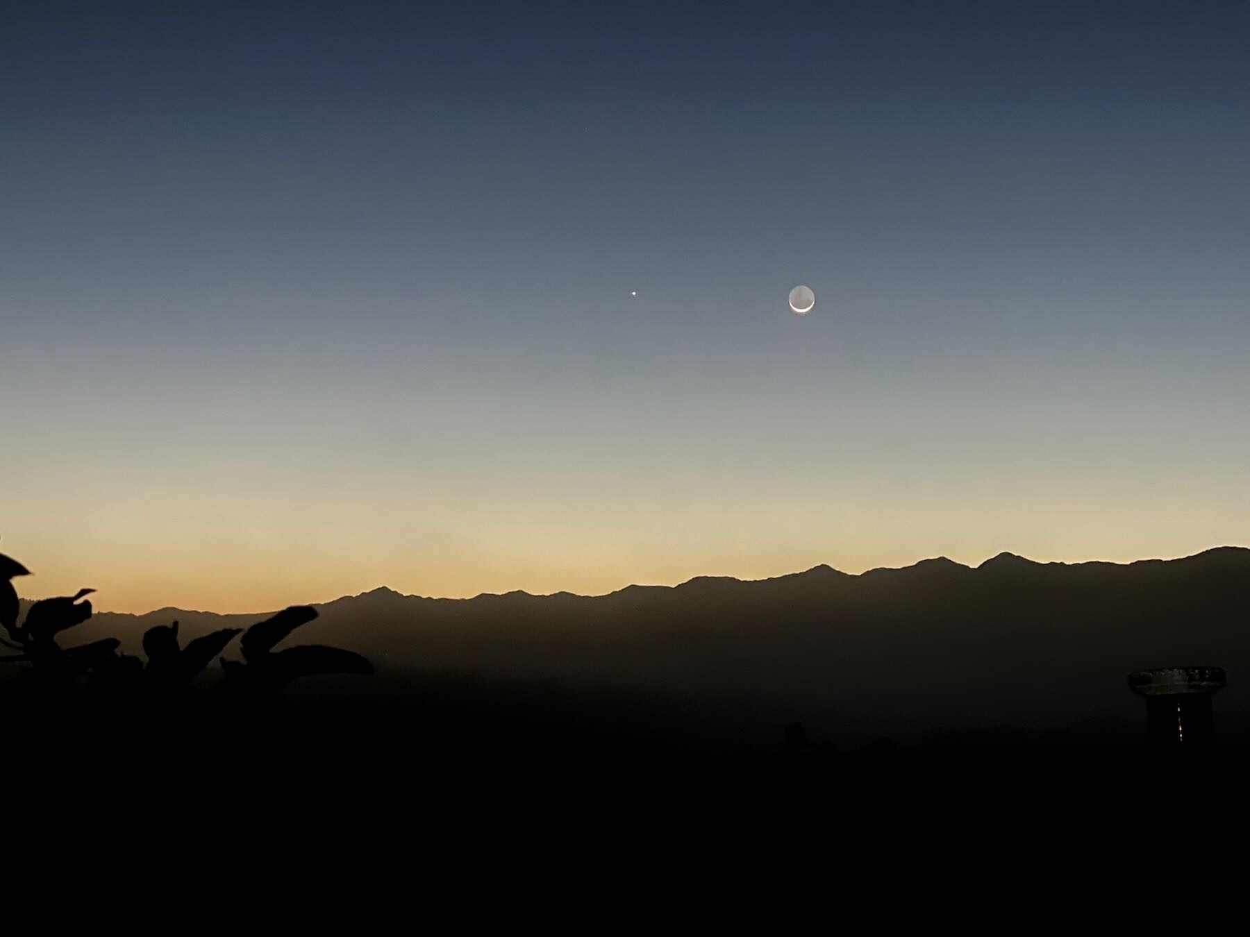 Gorgeous morning with crescent moon and Jupiter below a clustering of Venus Mars and Saturn. 