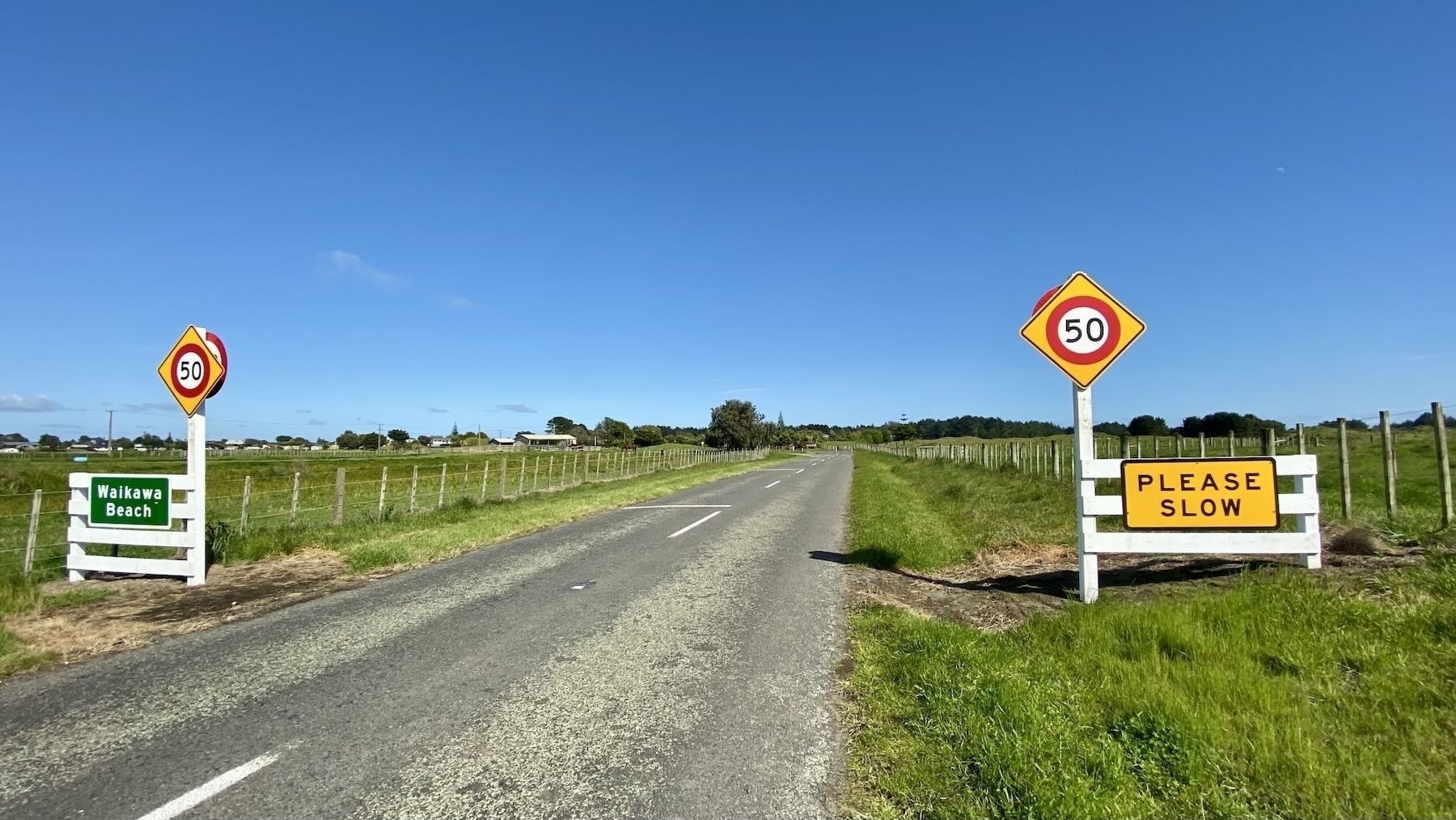 Village entrance speed signs. 