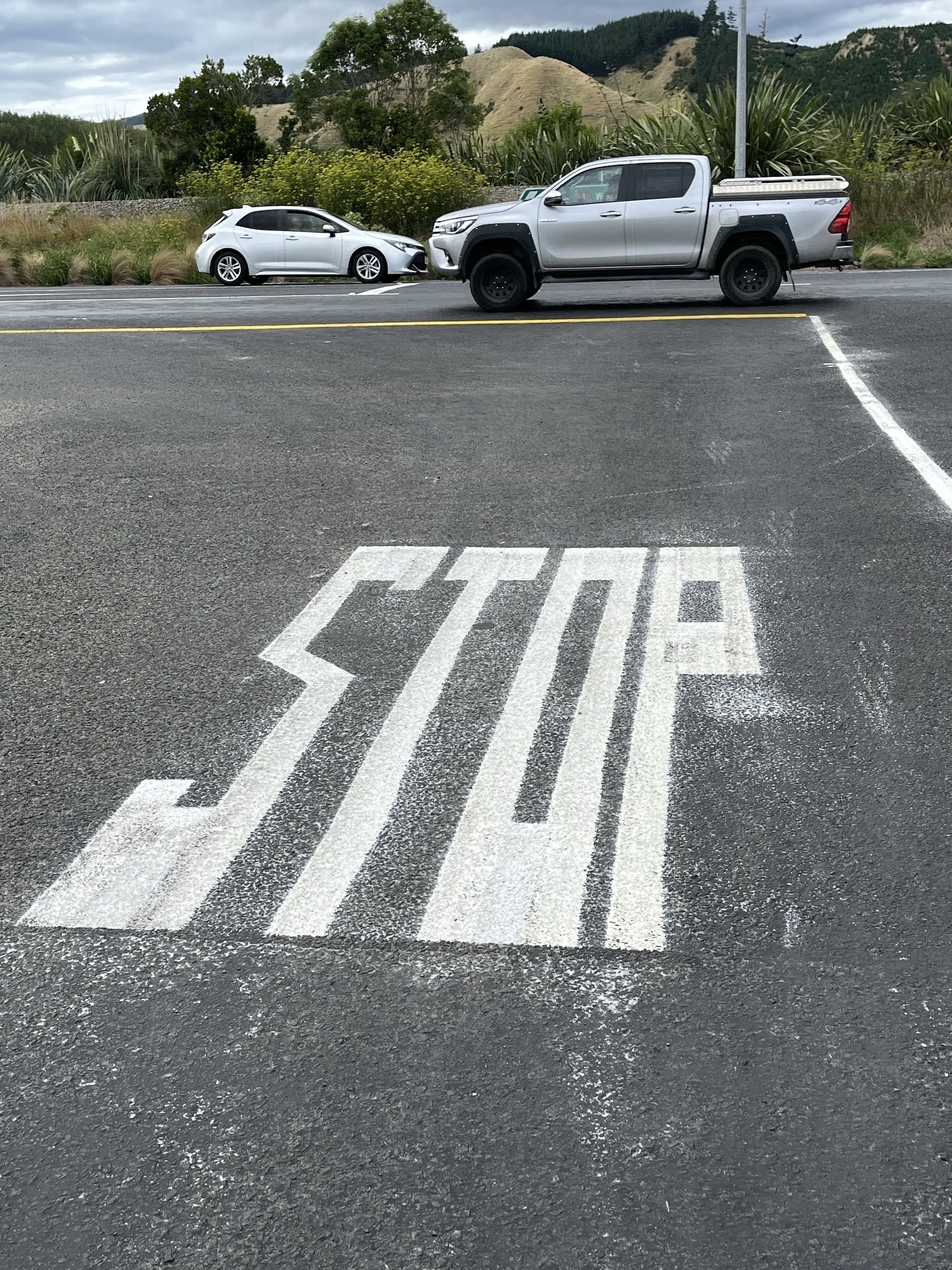 Freshly painted Stop markings. 