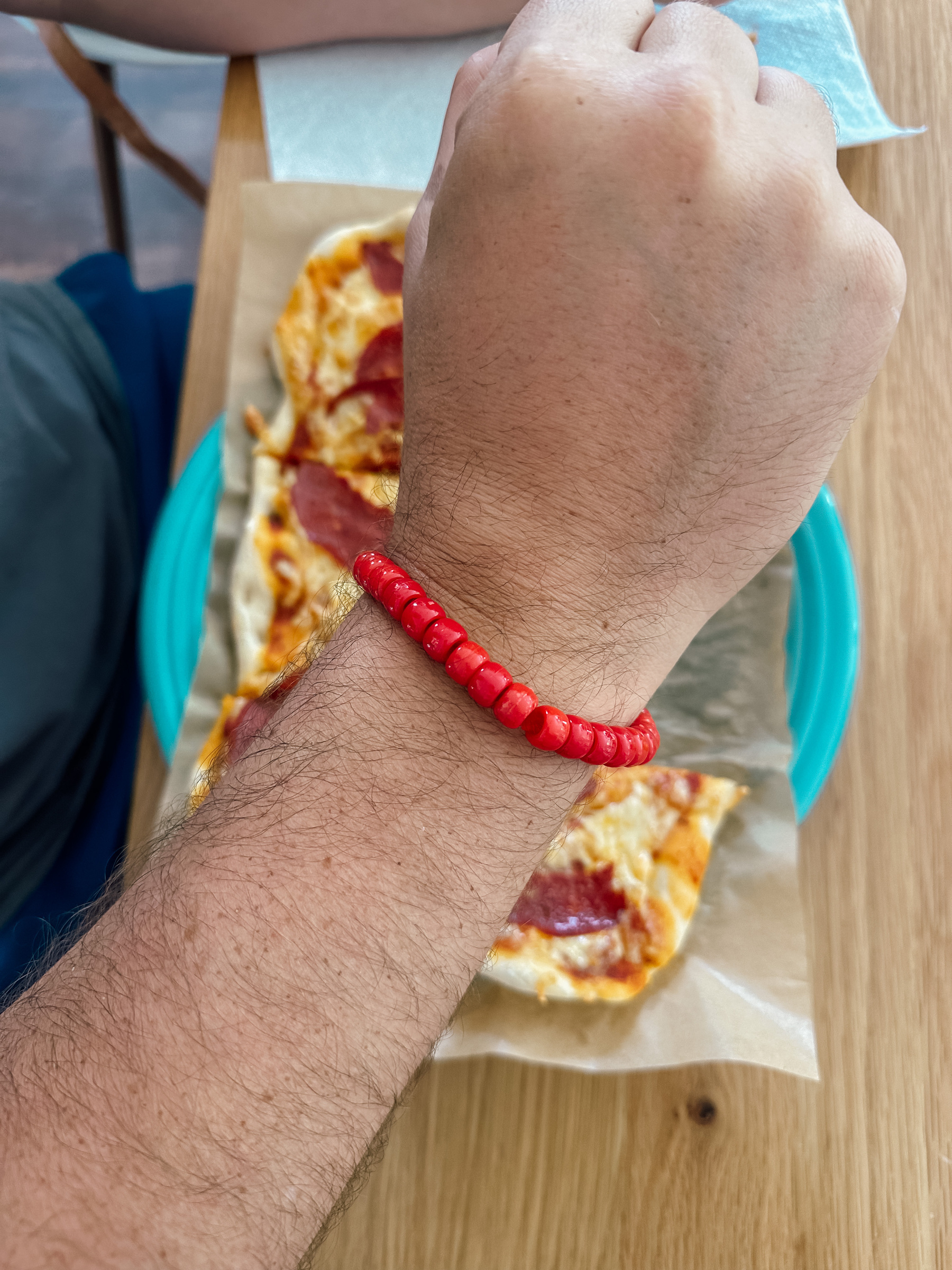 An all red pony bead “pizza” bracelet made by my daughter