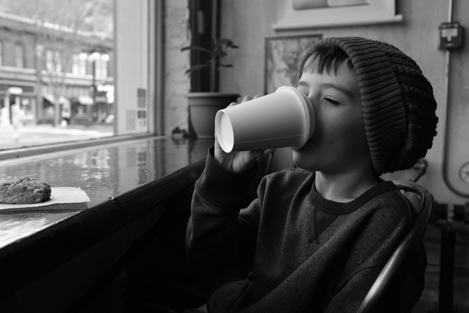my boy sipping coffee in downtown Hot Springs